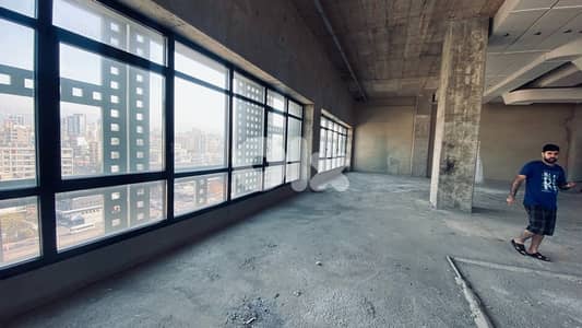 High ceiling office open space Gym pilates wellness fashion designer