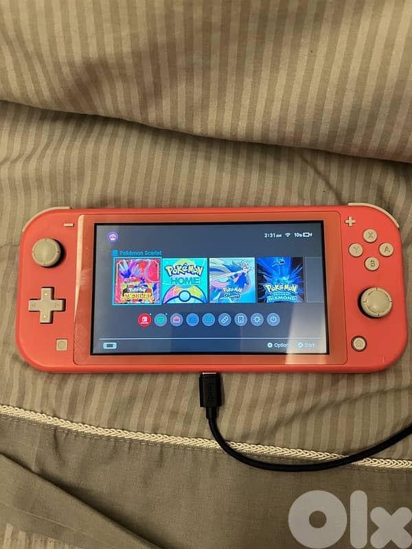 Nintendo Switch Lite + Pokemon Scarlet 1