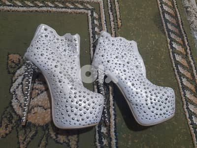 حذاء شتوي كعب عالي