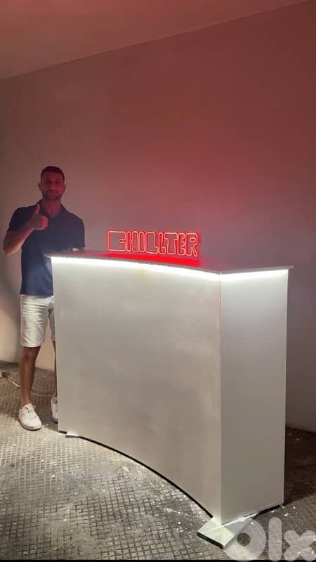 Modern Curved Display Stand with LED Lights – $220 0