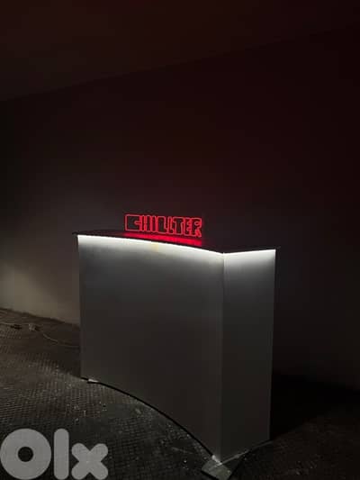 Modern Curved Display Stand with LED Lights – $220