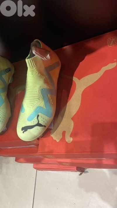 44.5 Puma football cleats