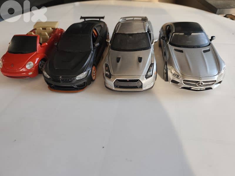 maisto 1/24, 4 cars,new beetle,nissan gtr,mercedes amg gt,bmw m4-gts 0