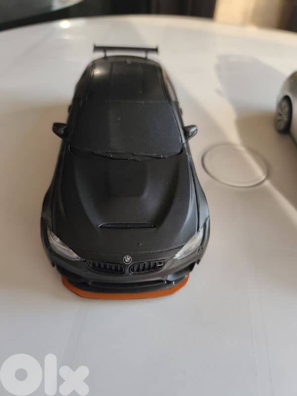 maisto 1/24, 4 cars,new beetle,nissan gtr,mercedes amg gt,bmw m4-gts 5