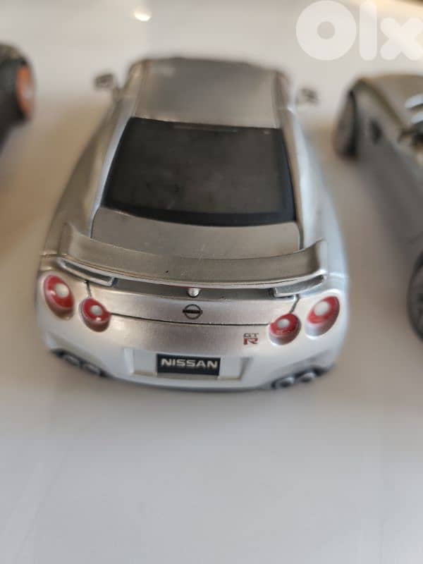 maisto 1/24, 4 cars,new beetle,nissan gtr,mercedes amg gt,bmw m4-gts 9