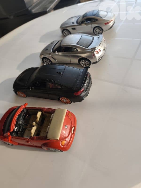maisto 1/24, 4 cars,new beetle,nissan gtr,mercedes amg gt,bmw m4-gts 16