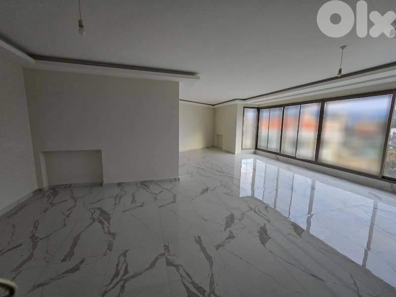 Apartment with Mountain Views and Terrace For Sale In Baabdat 0