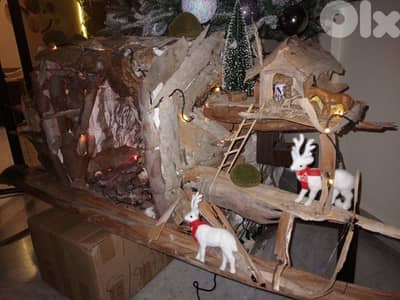 مغارة عيد ميلاد مصنوعة من قشر الشجر