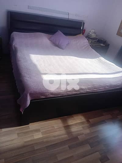king size bed with metres