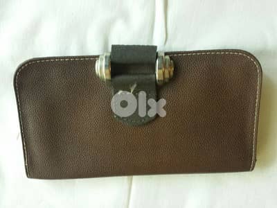 Elegant brown leather wallet - Not Negotiable