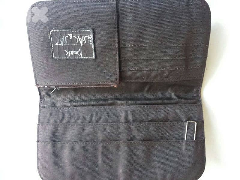 Elegant brown leather wallet - Not Negotiable 2