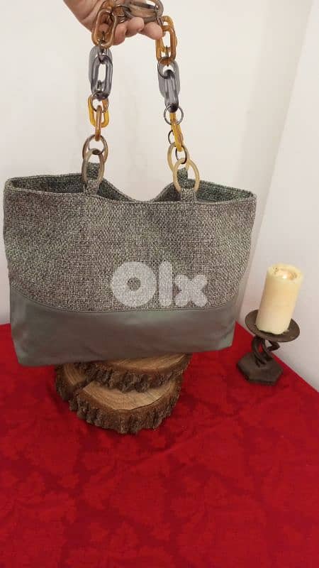 جزدان نسائي لون رمادي 0