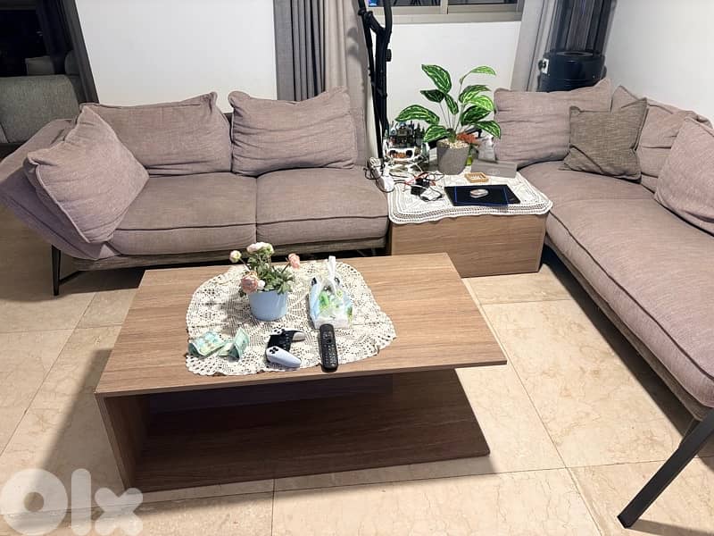 living room with 2 tables and a tv stand 1