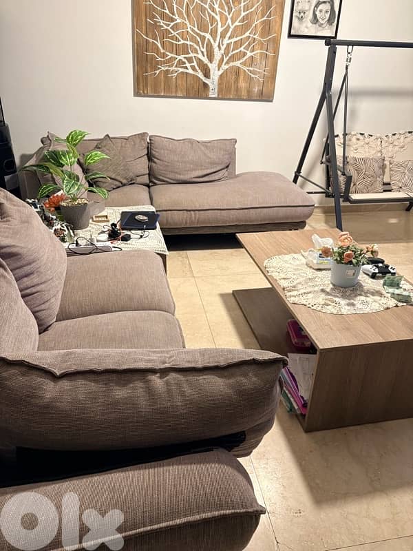 living room with 2 tables and a tv stand 2