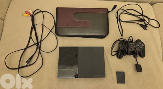 PlayStation 2 (used) with games