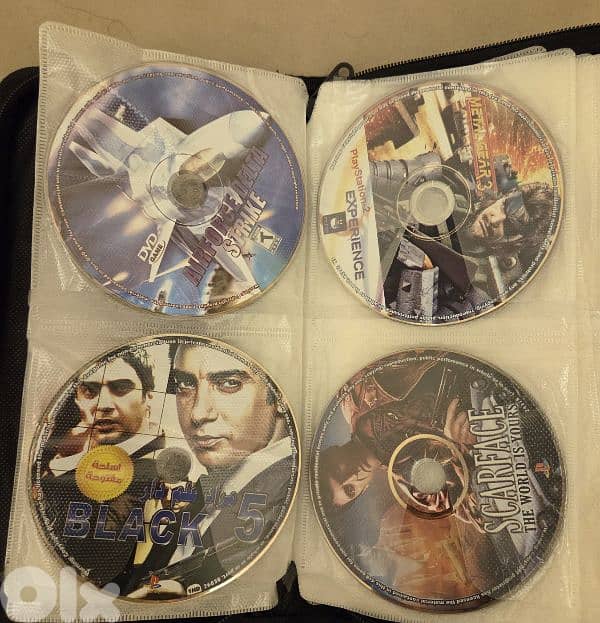 PlayStation 2 (used) with games 7