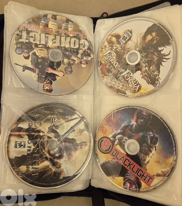 PlayStation 2 (used) with games 8