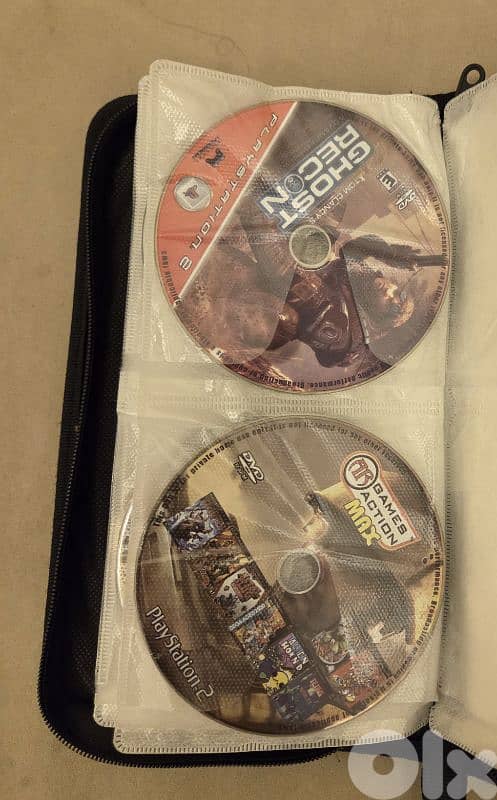 PlayStation 2 (used) with games 9