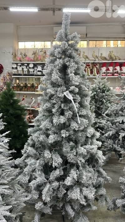christmas tree 240 cm for 200$ never been used still in box