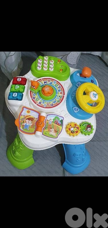 Baby activity  table  very clean like new 30$ byrt ashrafiye  03723895 6