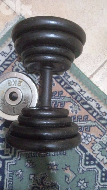 2 dumbells and 1 axe 3