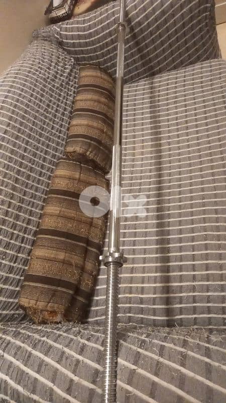 2 dumbells and 1 axe 4