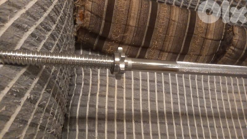 2 dumbells and 1 axe 5