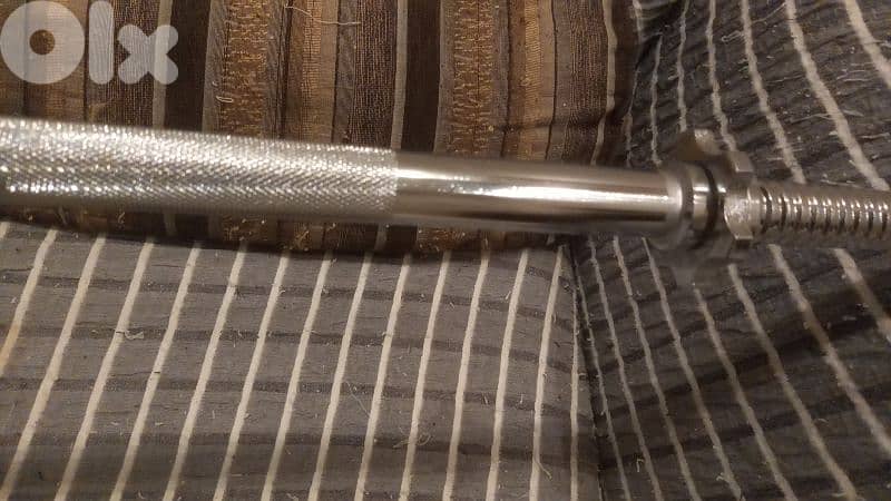 2 dumbells and 1 axe 6