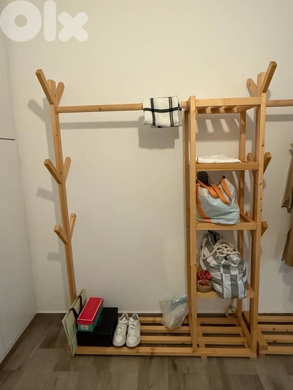 clothes hangers and makeup table 0