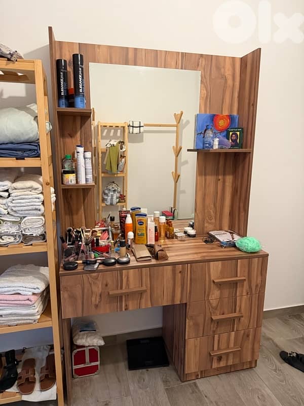 clothes hangers and makeup table 3