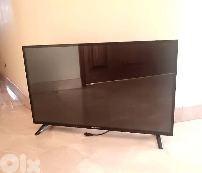 new smart tv hitachismart 40" with a free used dvd player 1