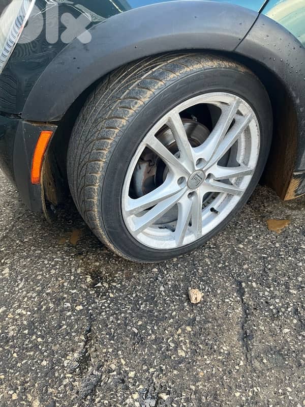 طقم جنوطة مع دوالي قياس ١٧ ( mini cooper )حالة جيدة جدا 1