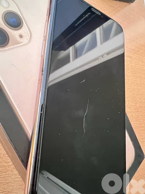 iPhone 11 Pro Max never repaired 8