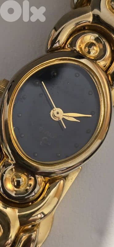 ساعة ماركة فخمة مغطسة بماء الذهب 2