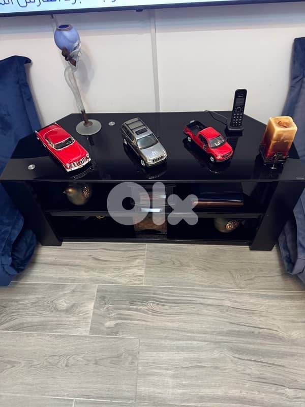 glass and wood TV stand 0
