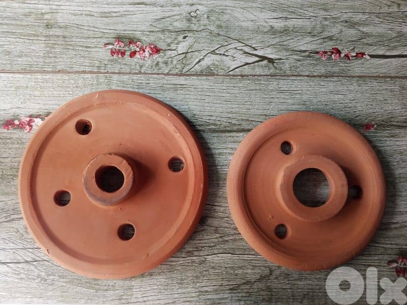 تقالة فخار 1