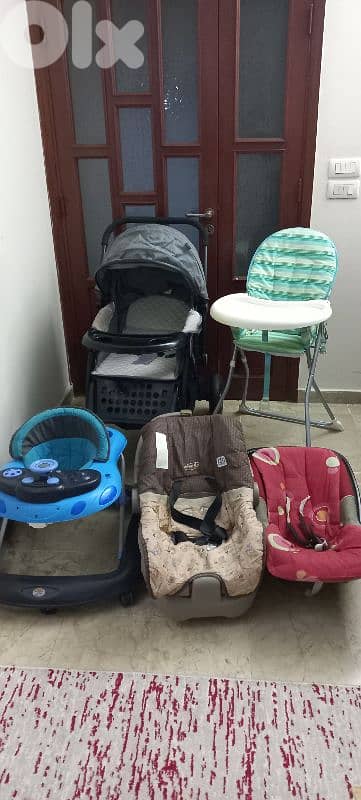 عرباية اطفال ومجموعة اغراض بيبي 90 0