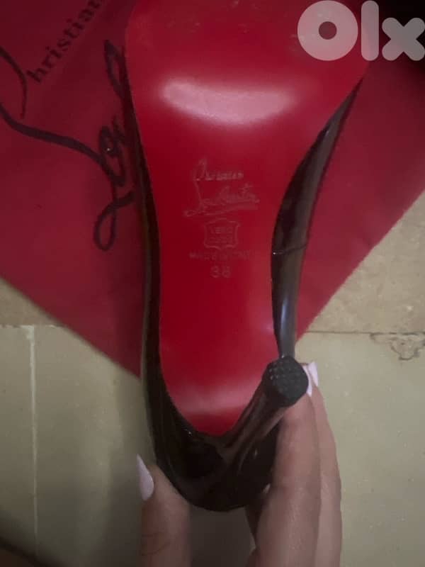 Christian Louboutin black shiny heels 1