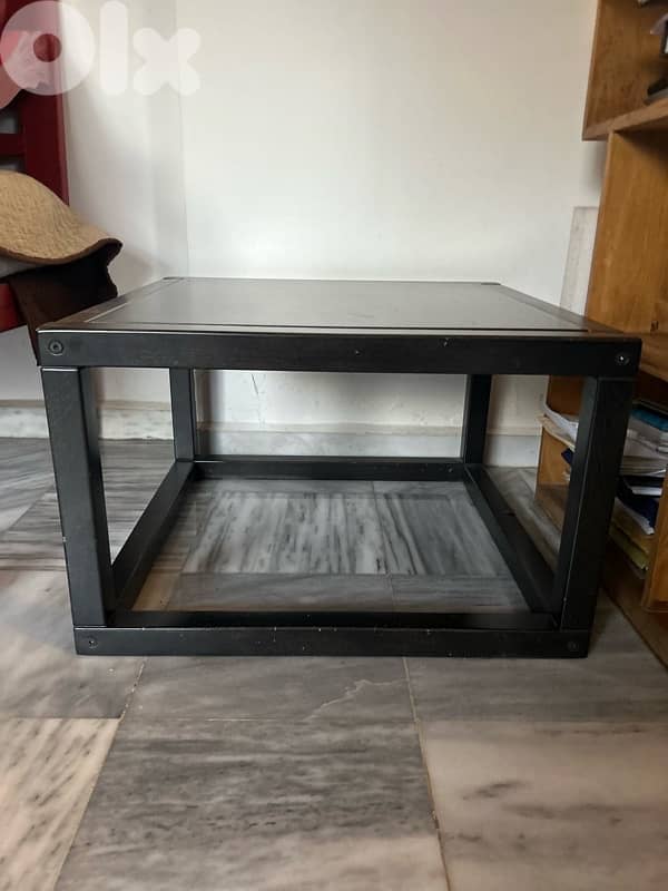Square black table. 0