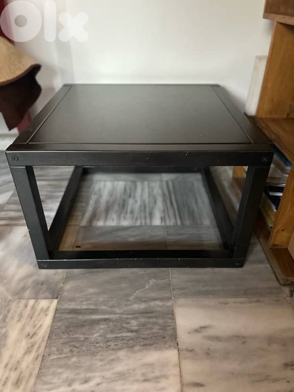 Square black table. 1