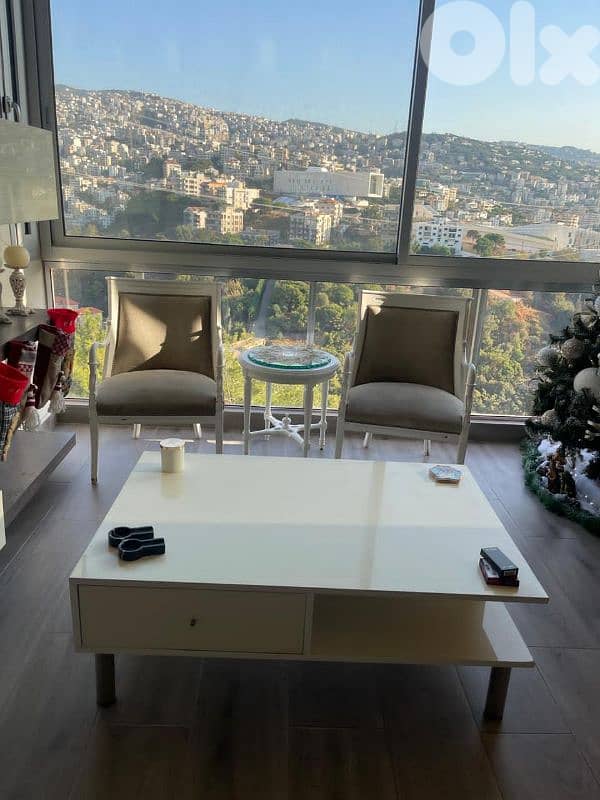 two chairs small table and big table 0