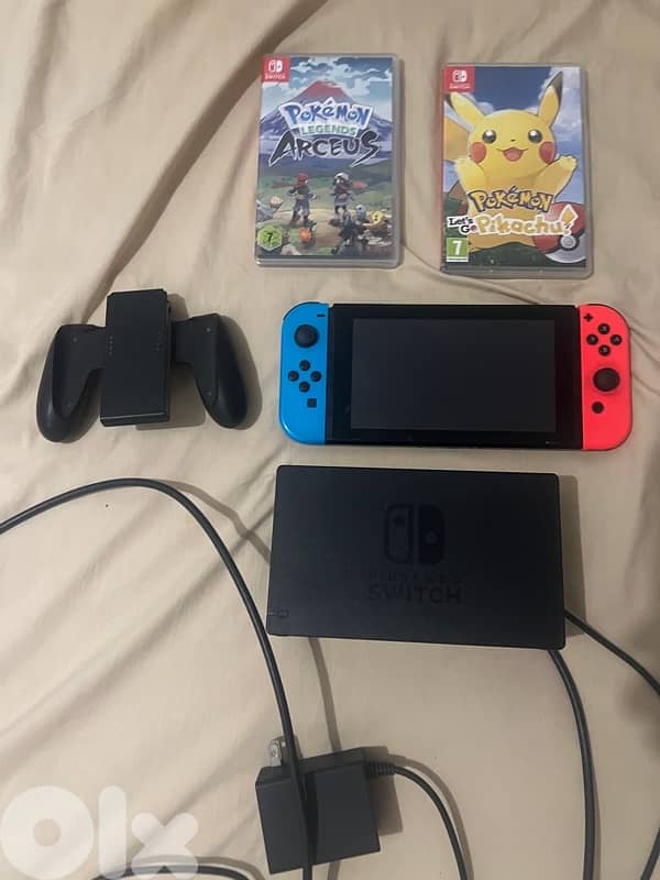 barely used Nintendo Switch + 2 Pokemon games 0