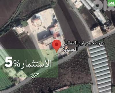 للبيع أرض في حلبا – مساحة 9600 م²، على الأوتوستراد REF#SM128747