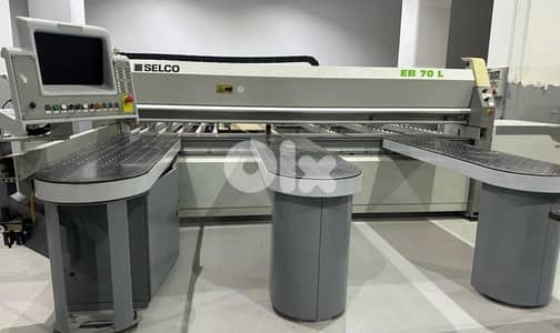 شاريو قص الواح لميكا ماركة Biesse و مكنة تقشيط. 03/083947