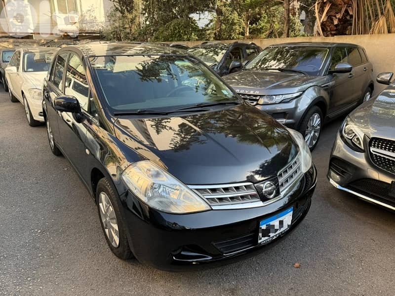 Nissan Tiida 2010 rymco source 1.6 0