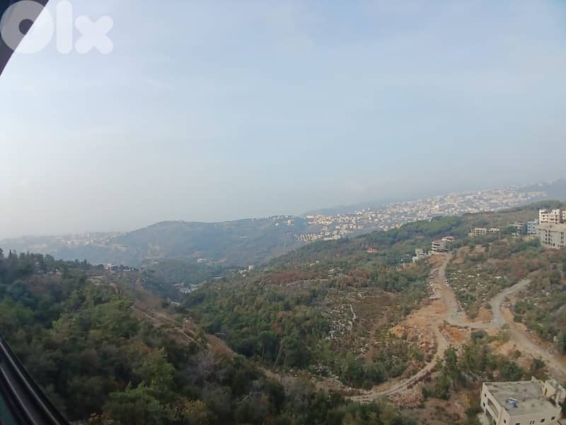 RWK116IY - Brand New apartment with roof for sale in Qornet el Hamra 0