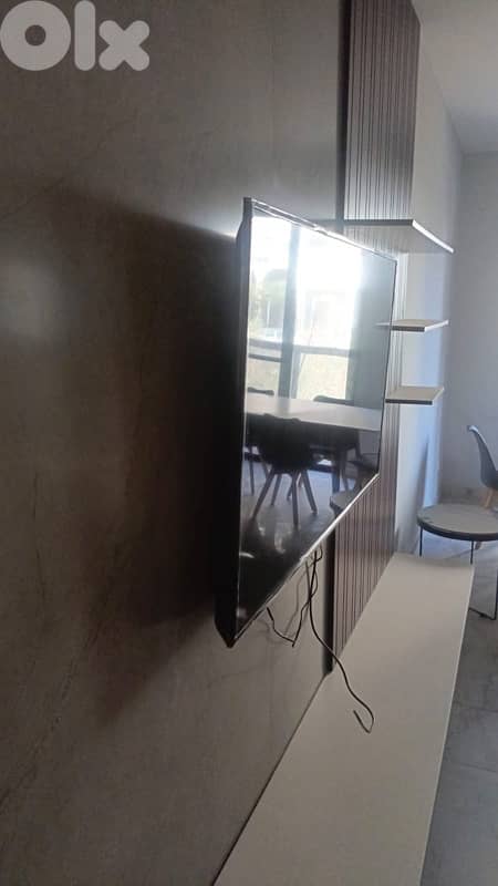 tornado toshiba new 58 inch (not used) 1