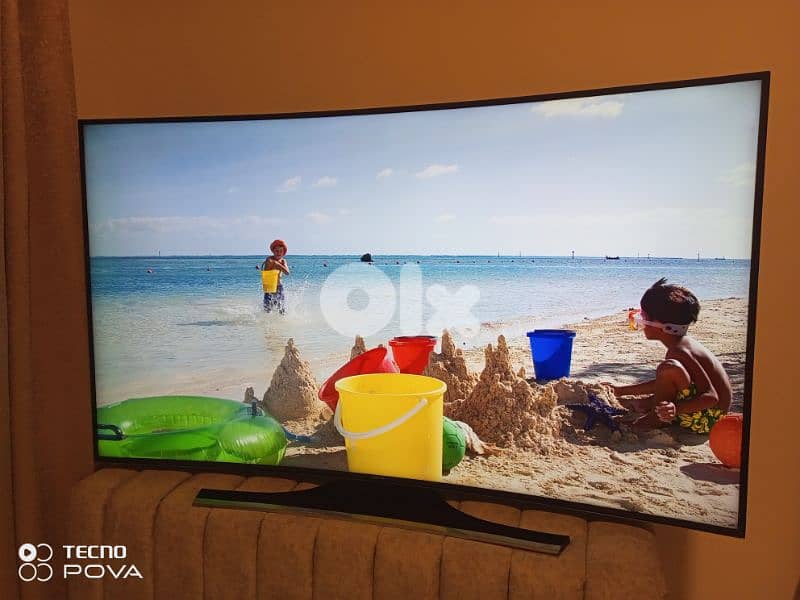 samsung tv 65inch smart curve 4k ultra Hd remote magic control like ne 0