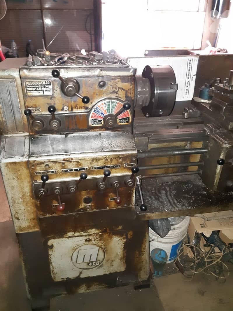 مخرطة حديد عدد ٢. الكبير الماني والصغير اميركي. 0