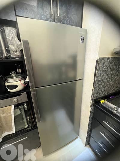 like new refrigerator Samsung like new silver